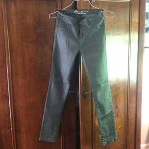 Coated denim skinny jeans
